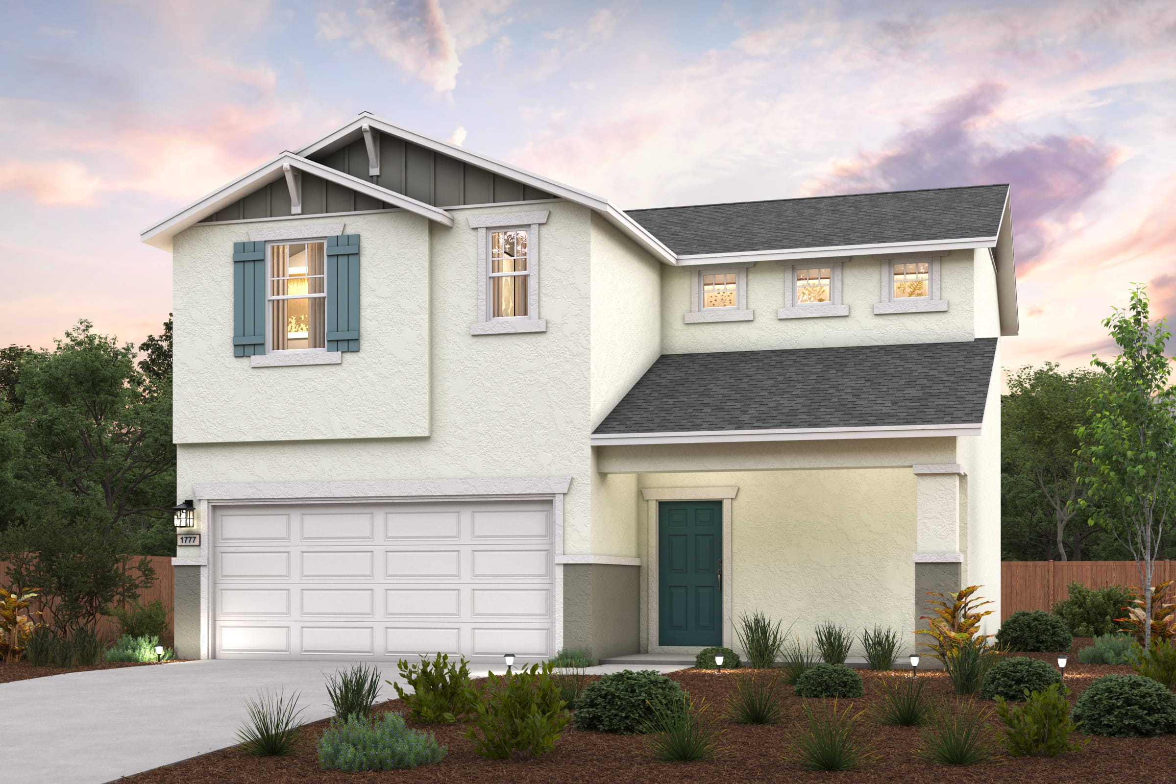 A white house with a garage.