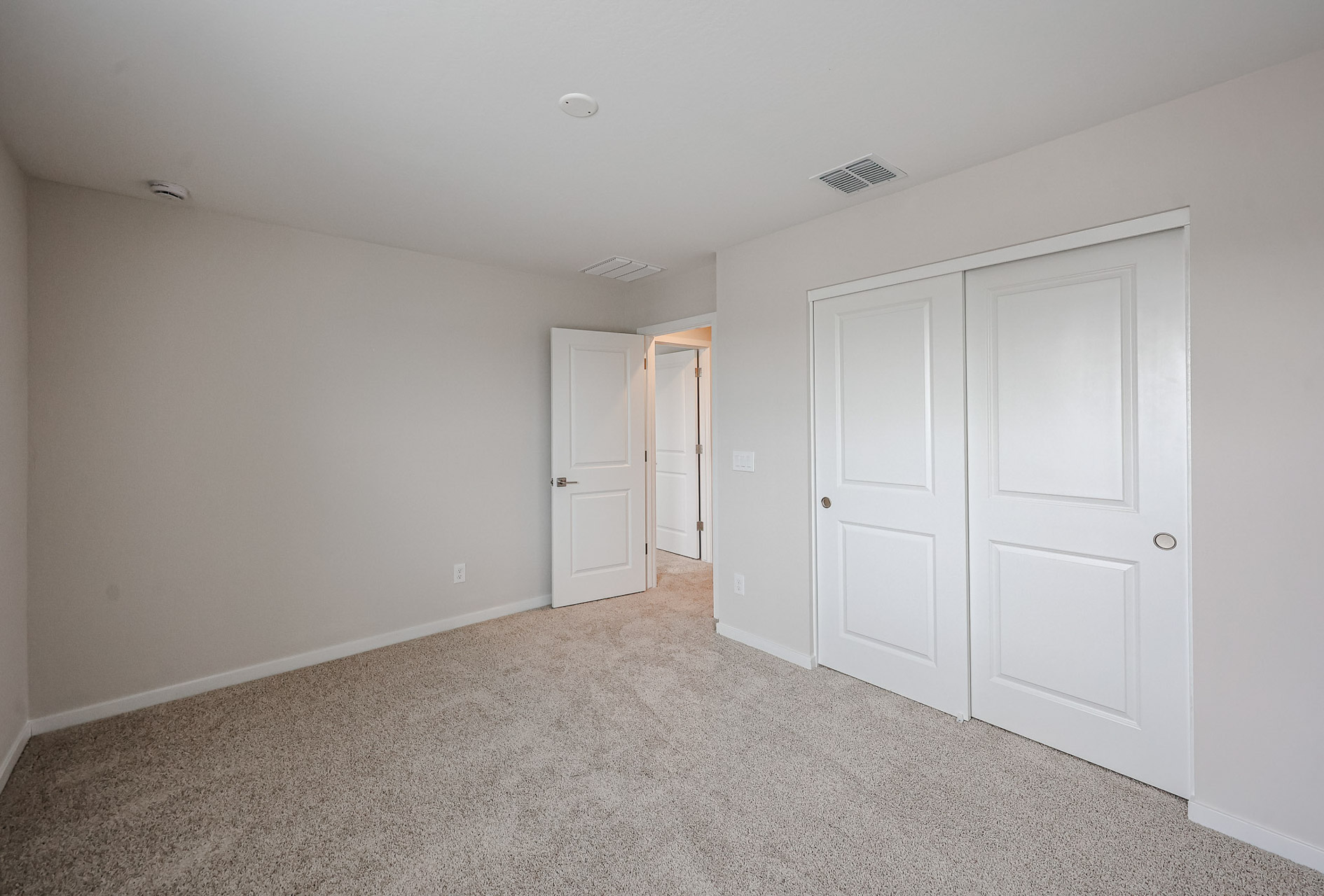 A room with white doors.