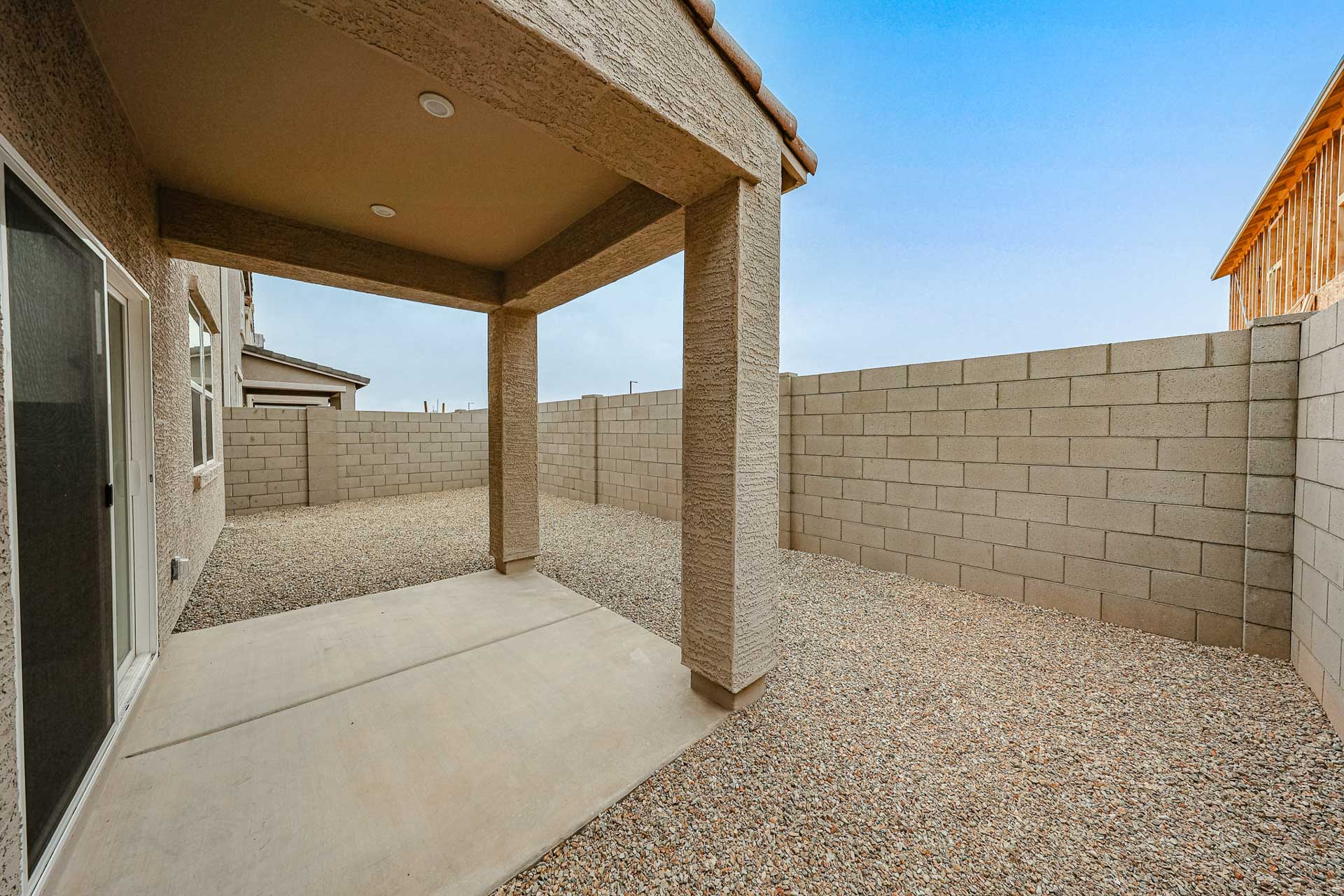 A stone wall with pillars.