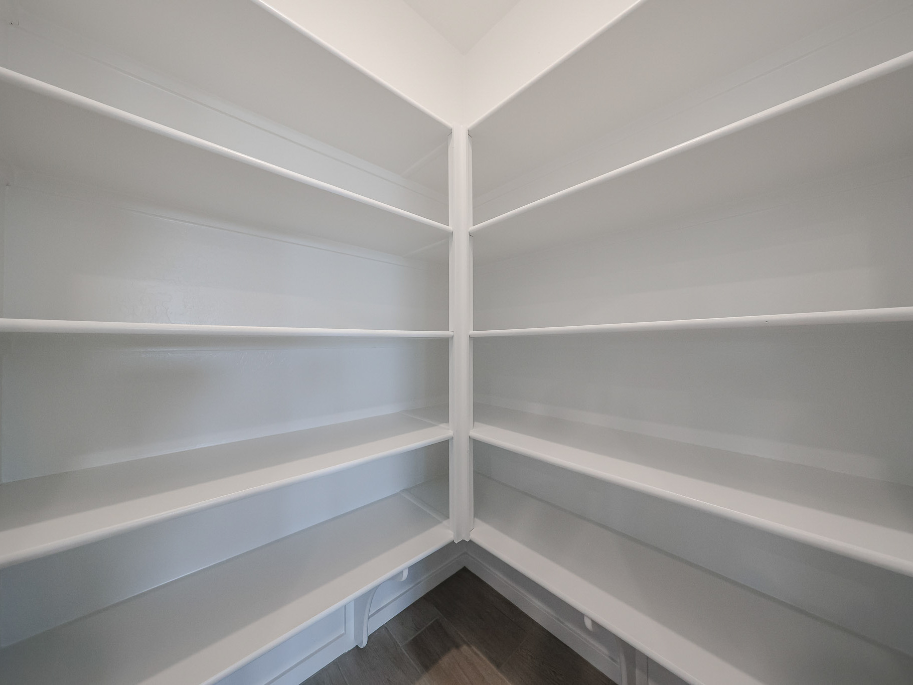 A white staircase with white railings.