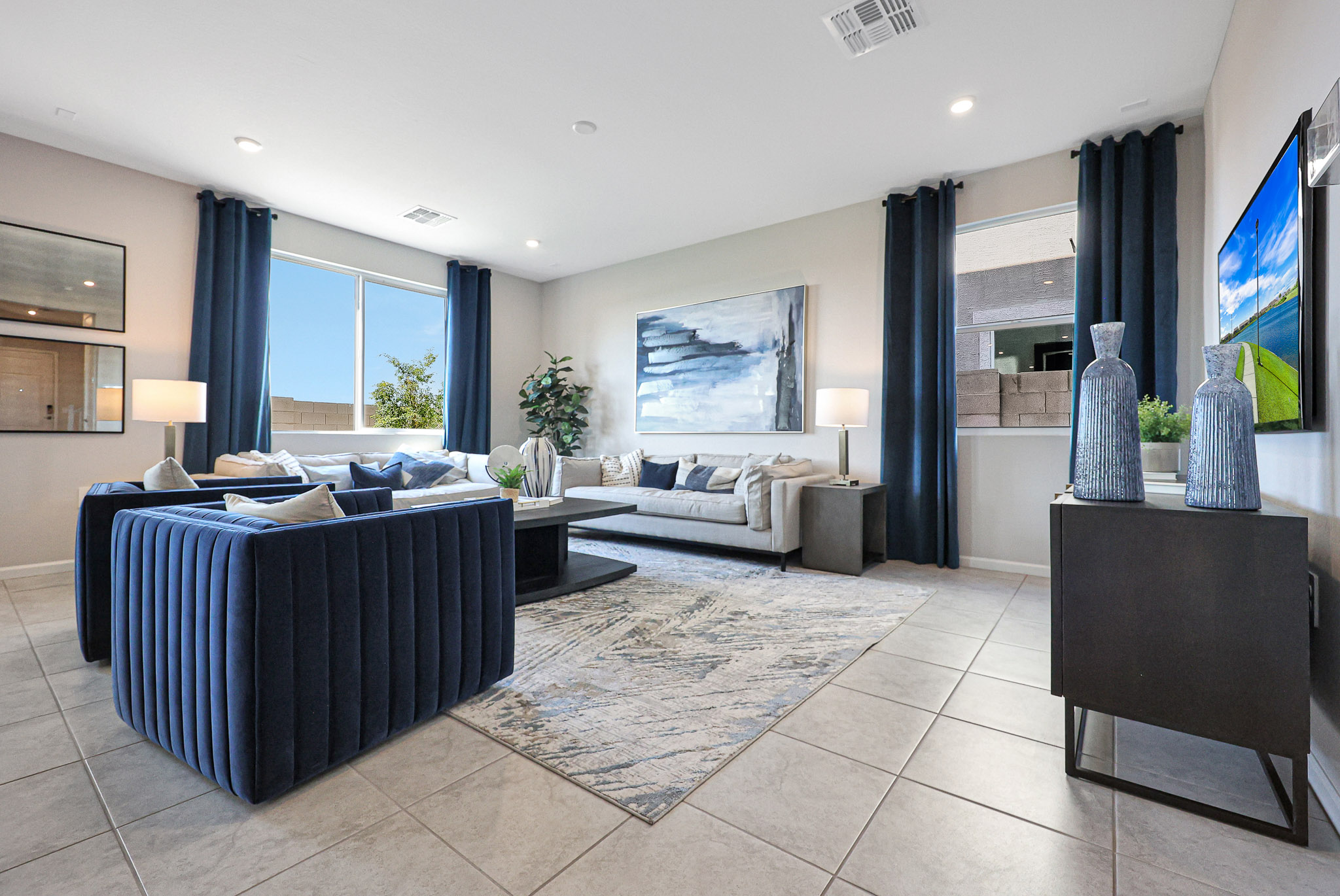 A room with a bed and a couch.