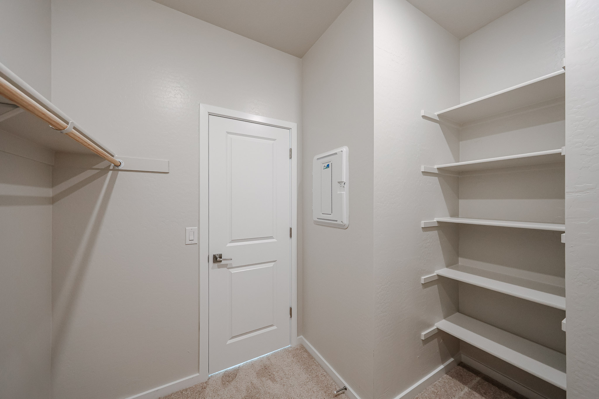 A white door in a room.