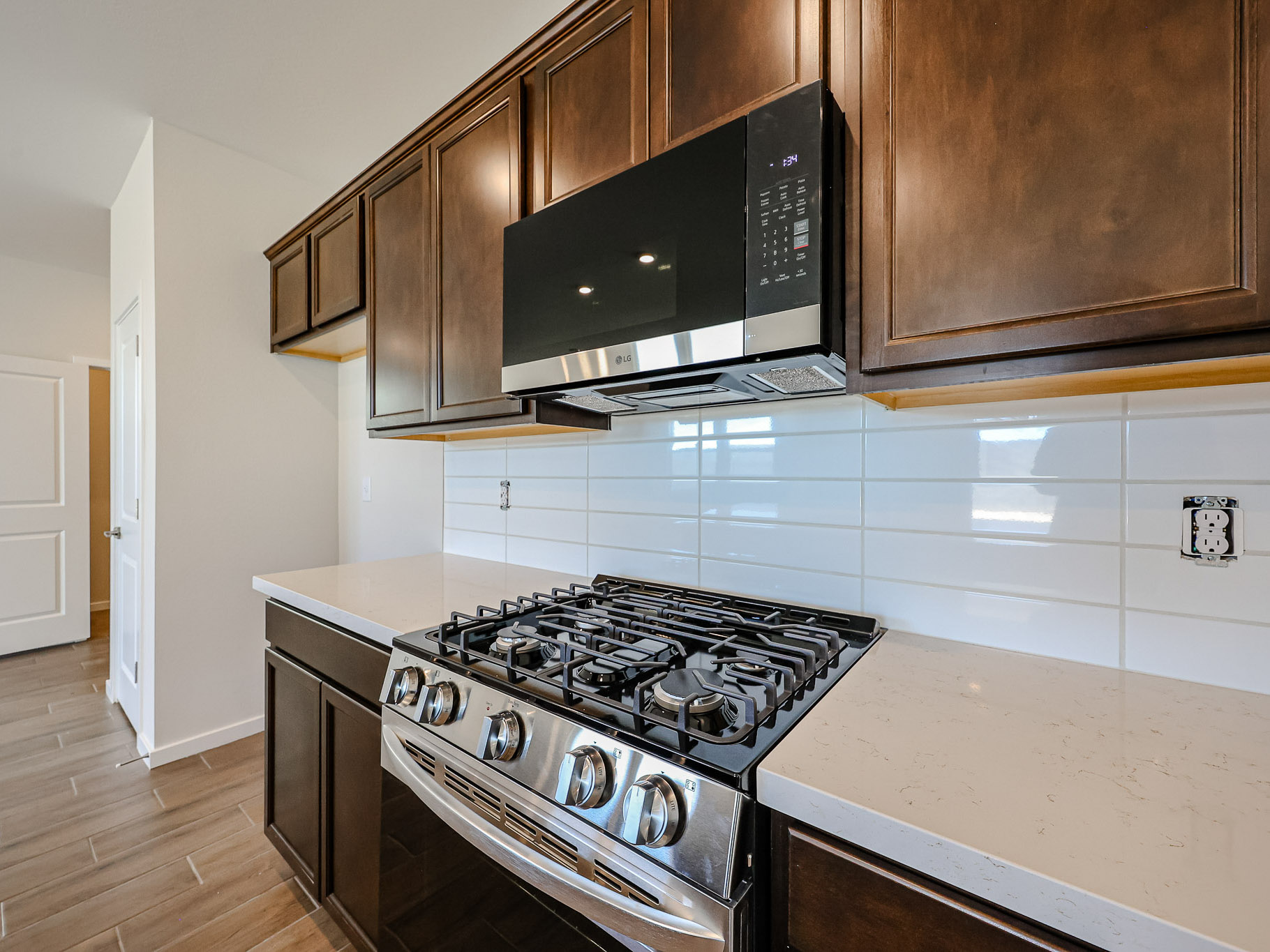 A kitchen with a stove and oven.