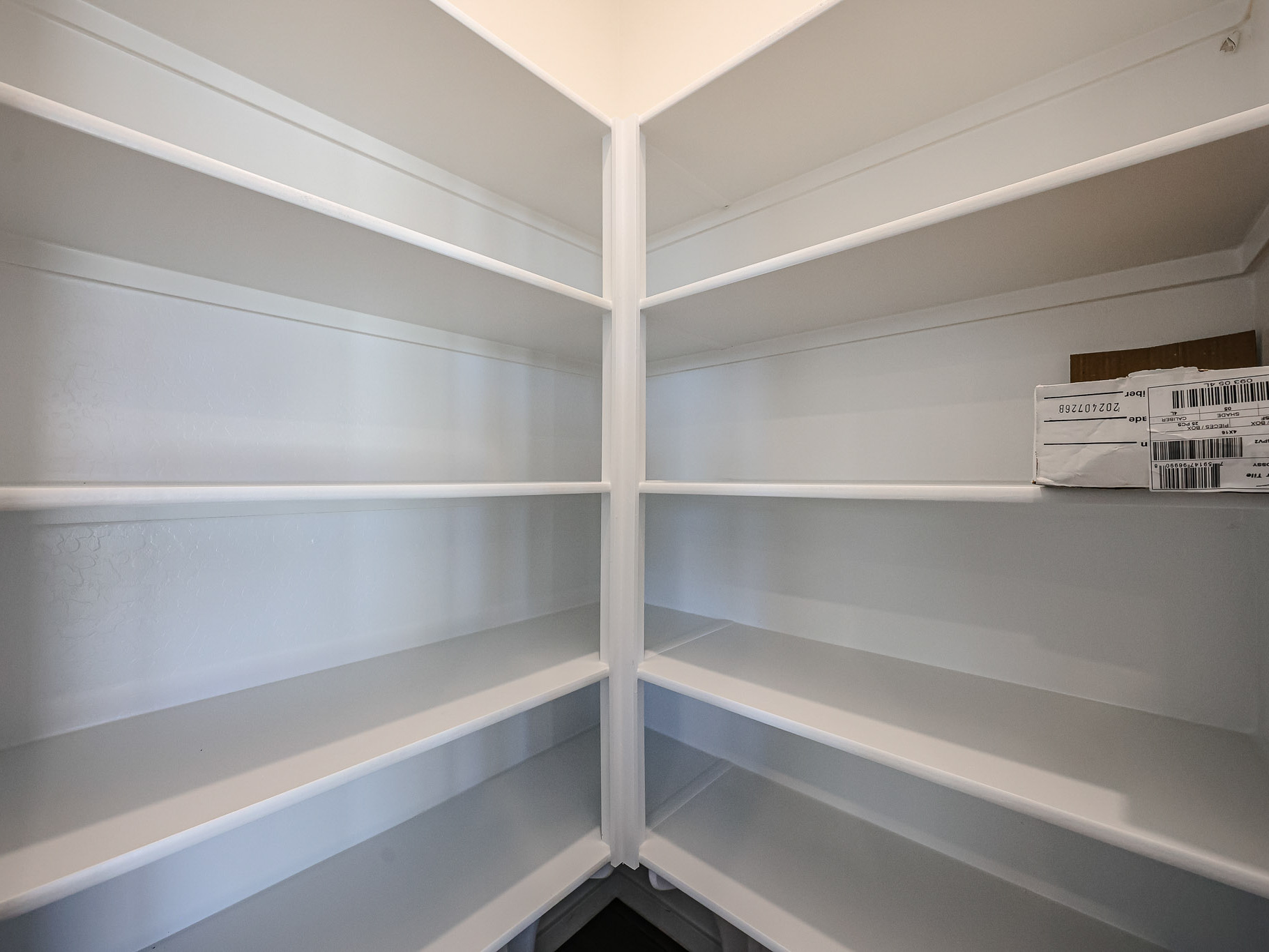 A white shelf with white shelves.