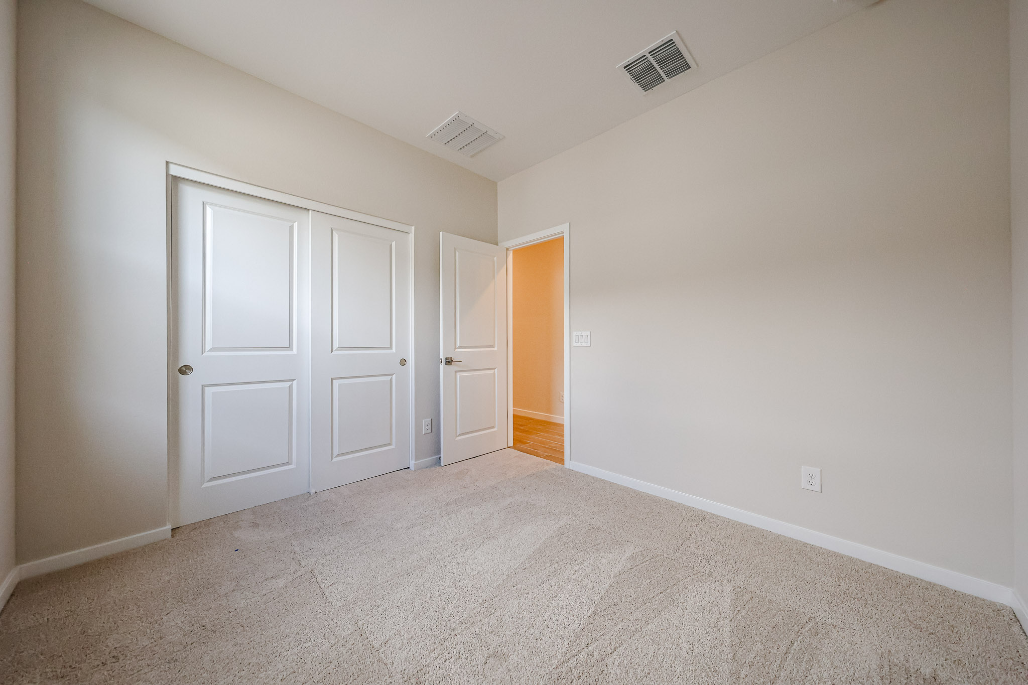 A room with white doors.