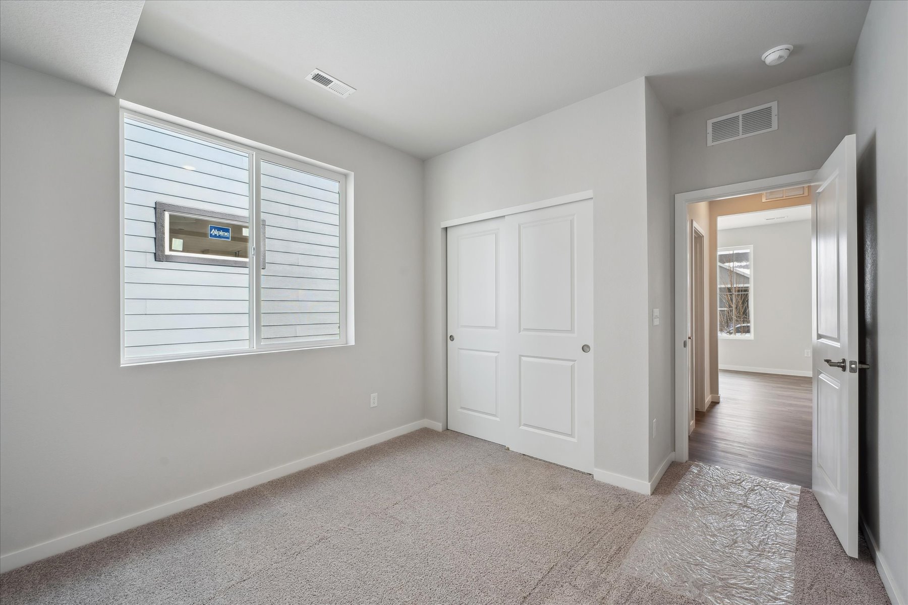 A room with white doors.