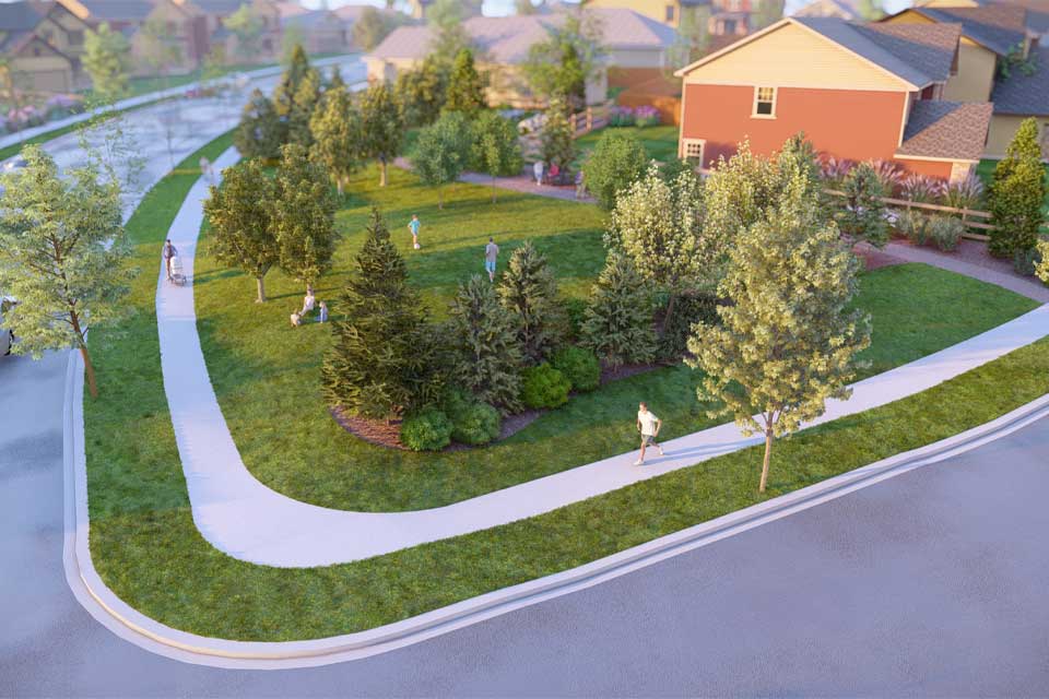 A large lawn with trees and a building in the background.