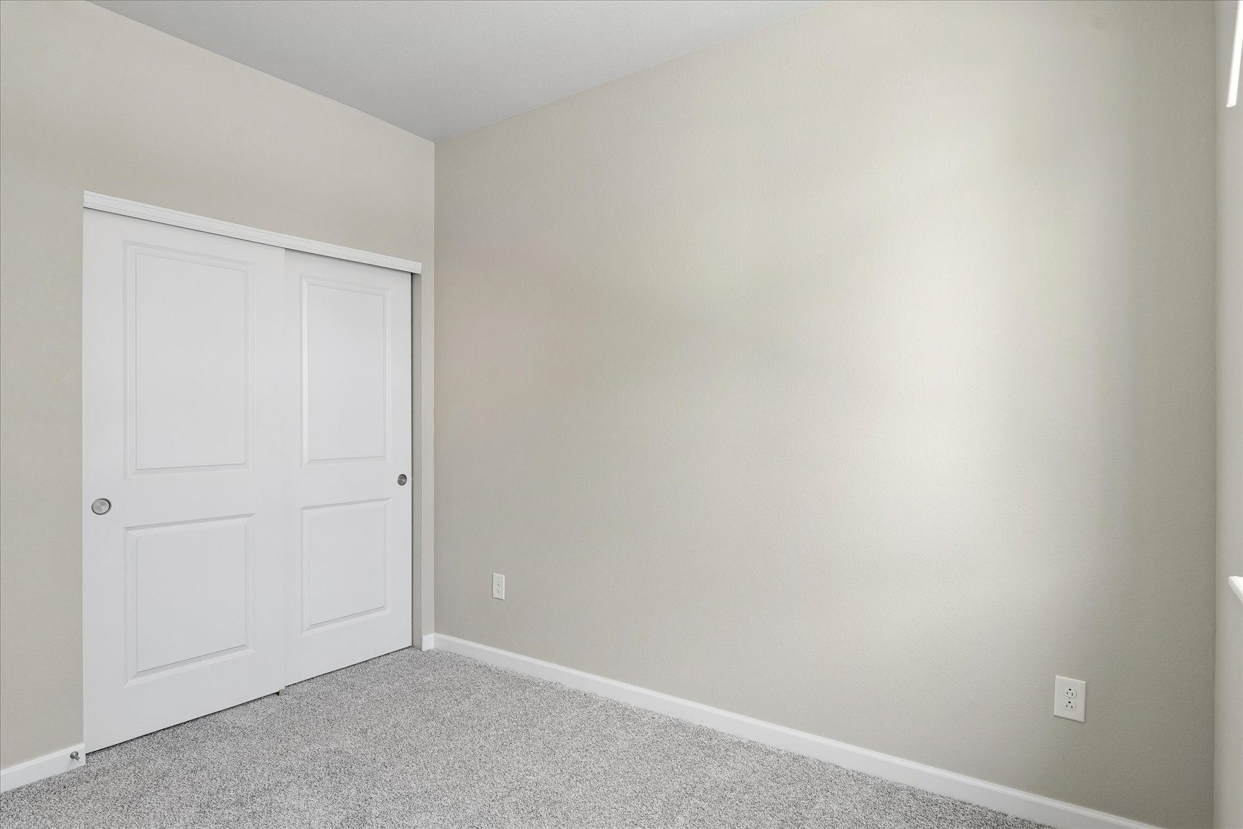A white door in a room.