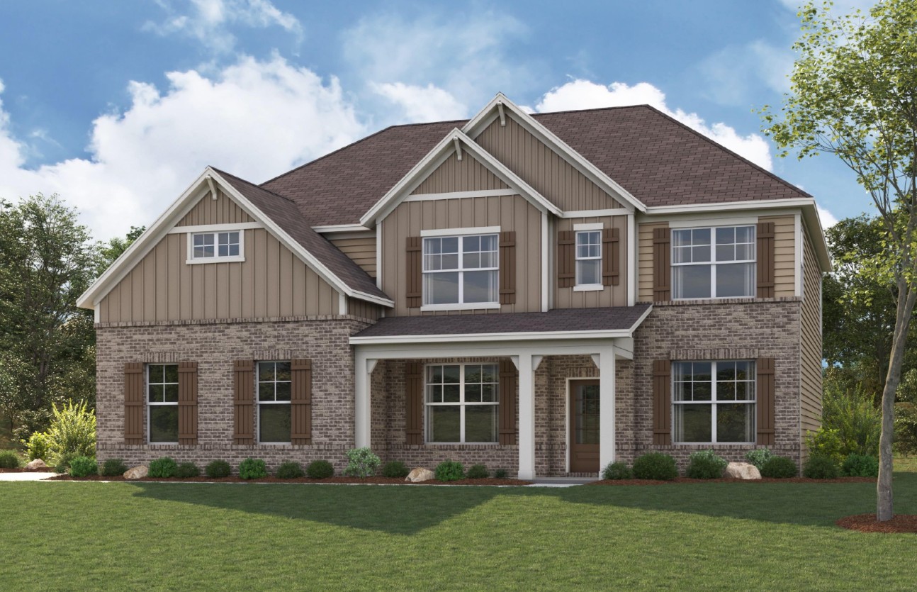 A house with a lawn in front.