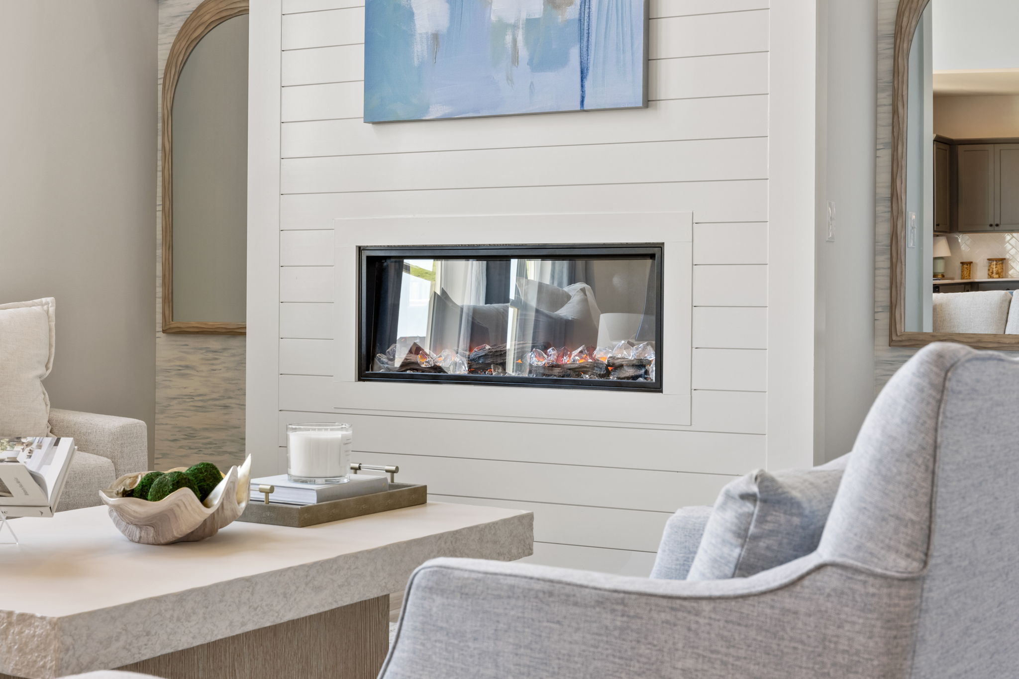 A living room with a fireplace.