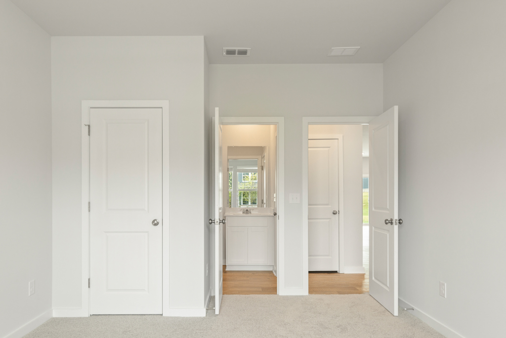 A room with white doors.