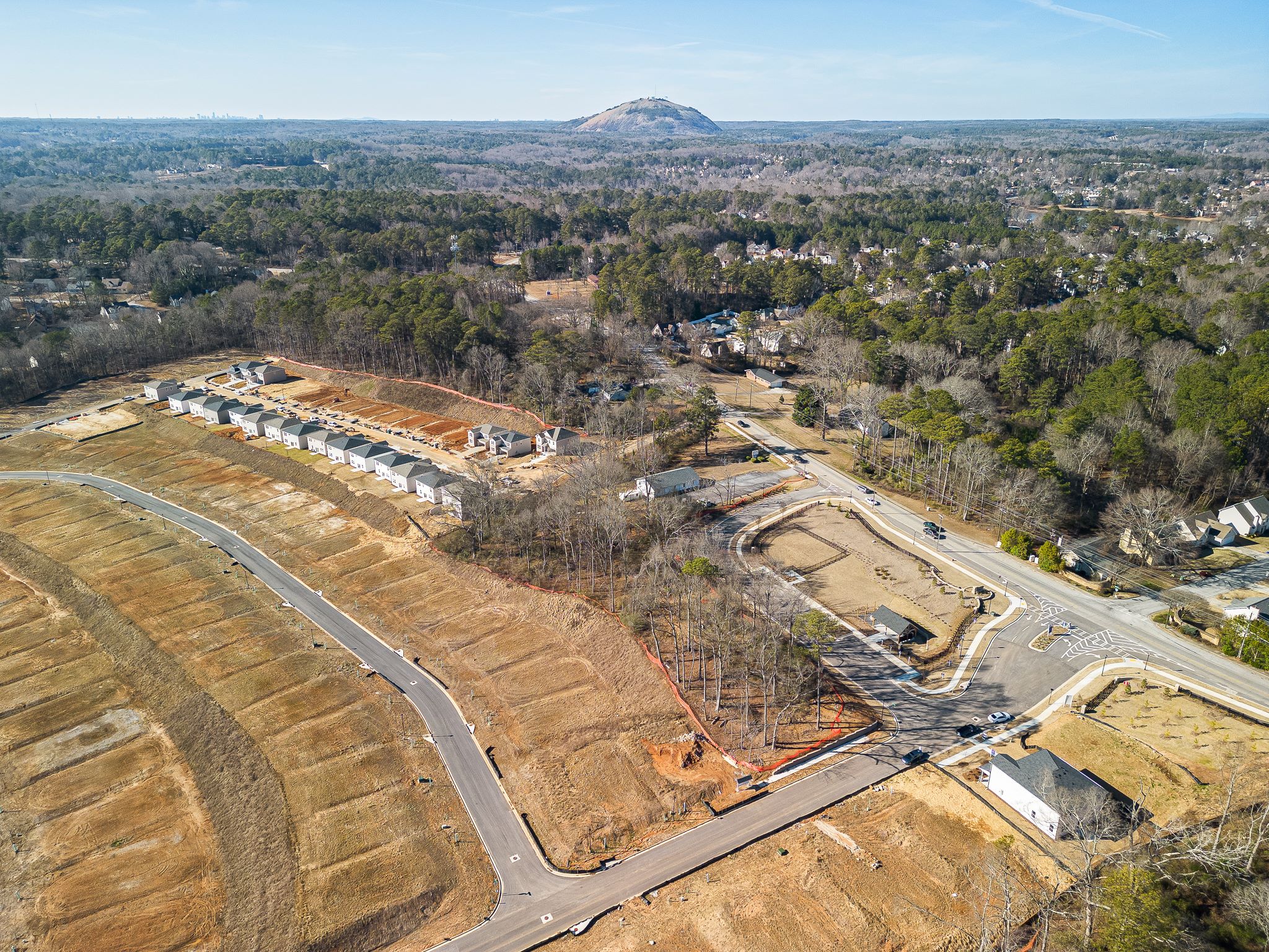 A highway with a mountain in the background.