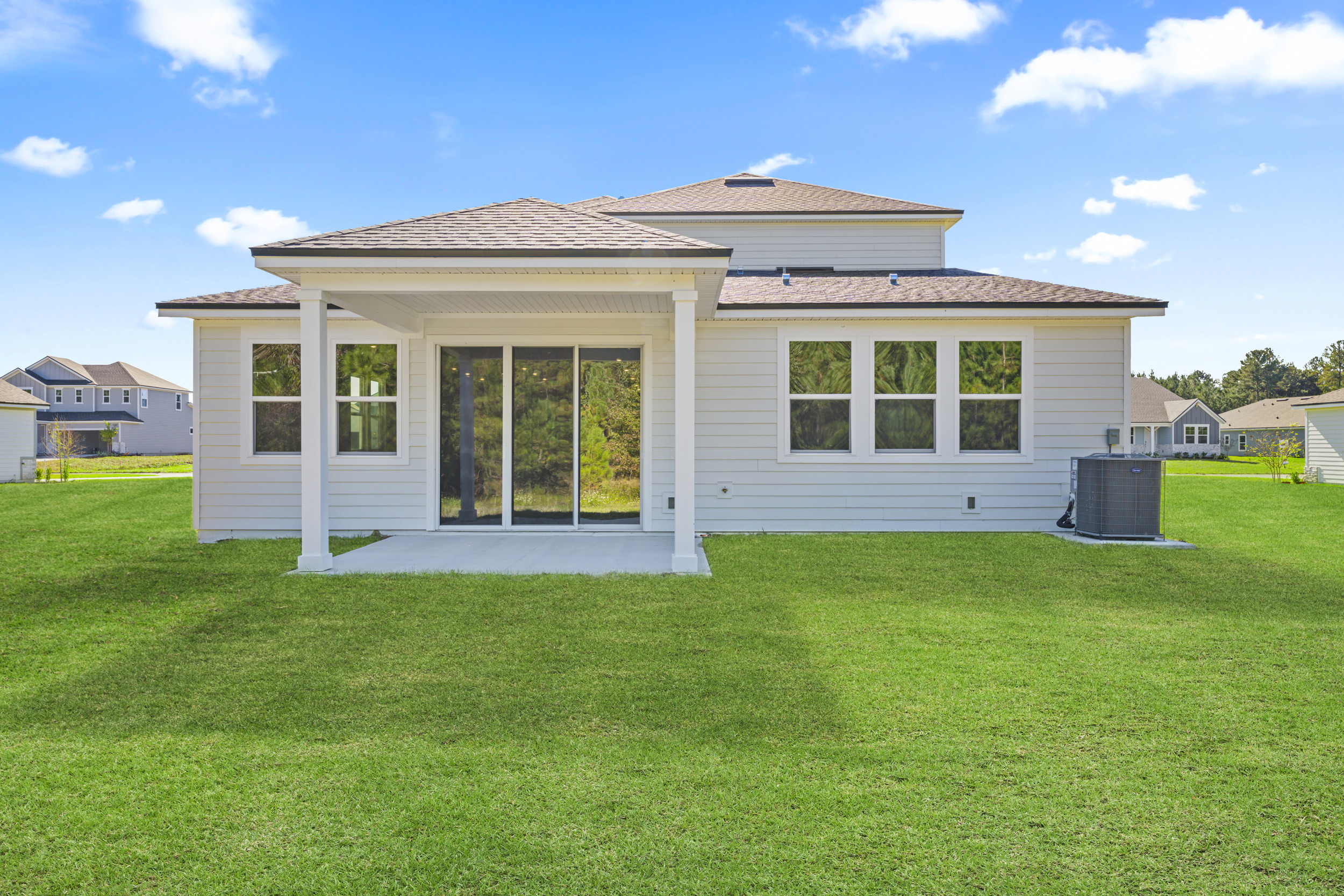 Lot 529 Rear Exterior with Covered Patio at NorthShore in Kingsland
