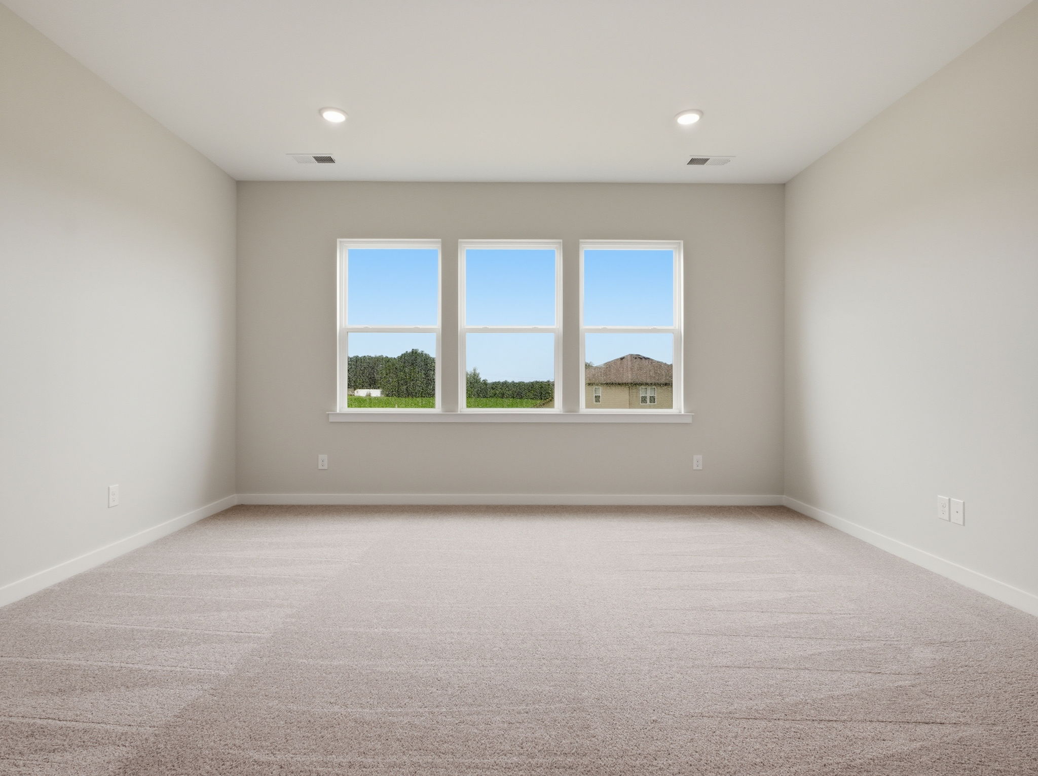 A room with a large window.