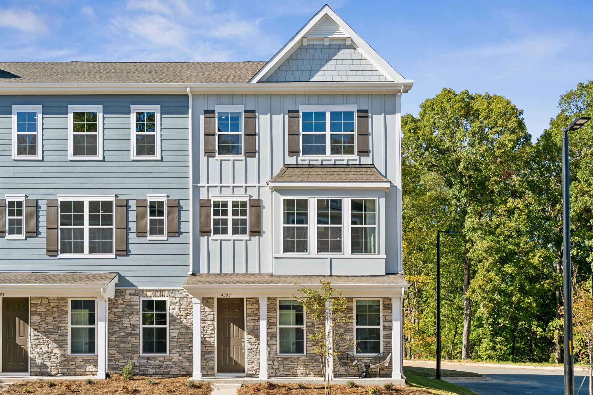 A large building with trees in front of it.