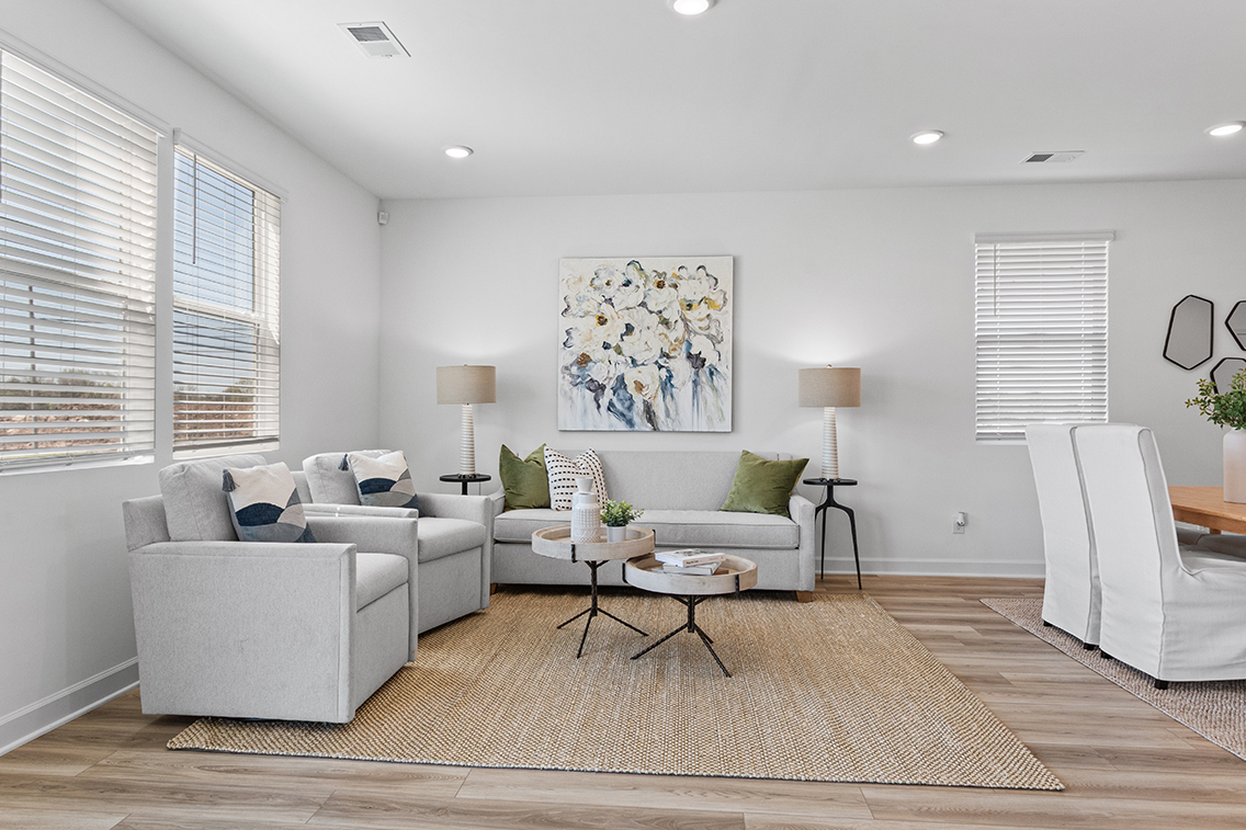 A living room with a couch and a coffee table.