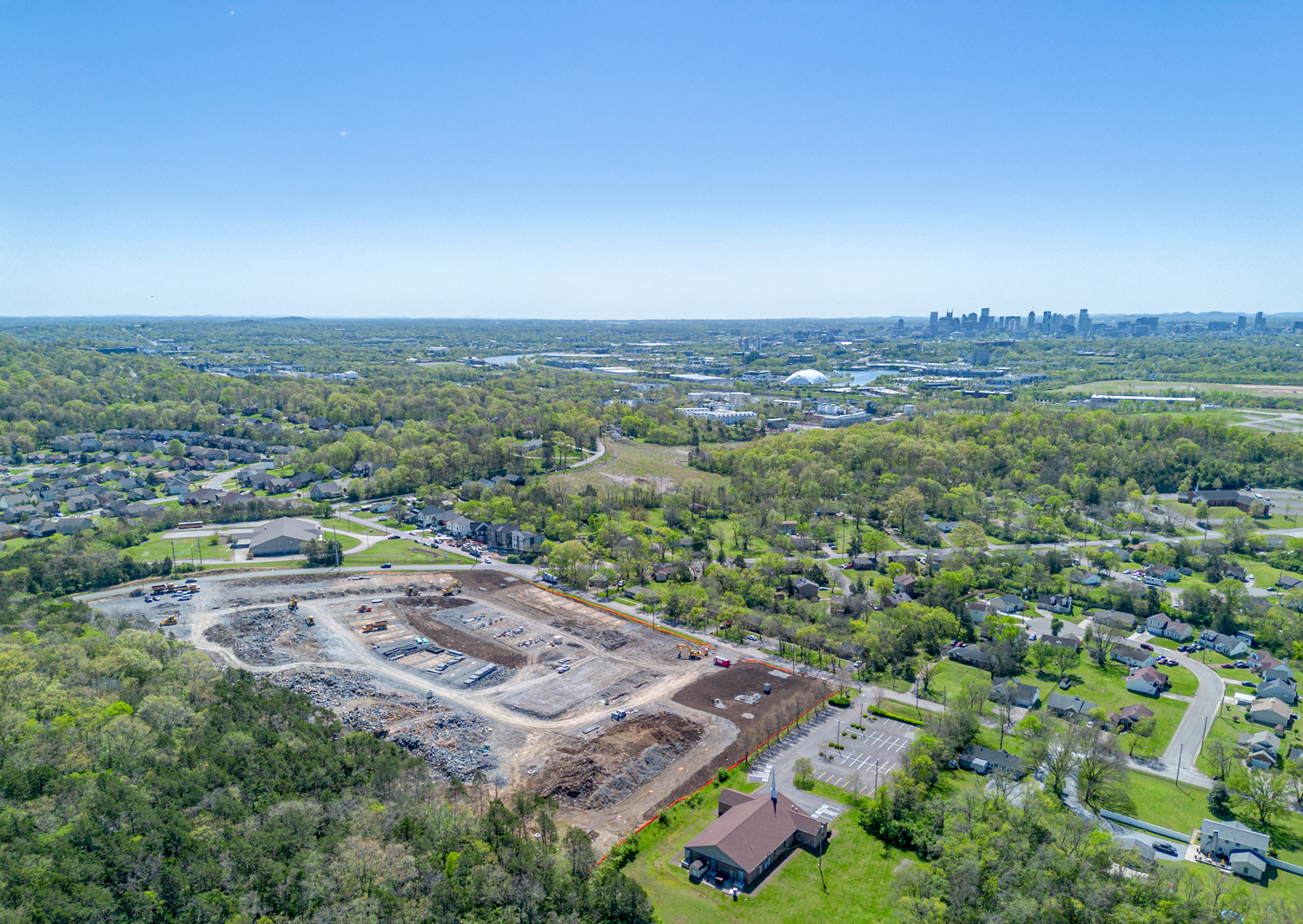 A landscape with a river and trees.