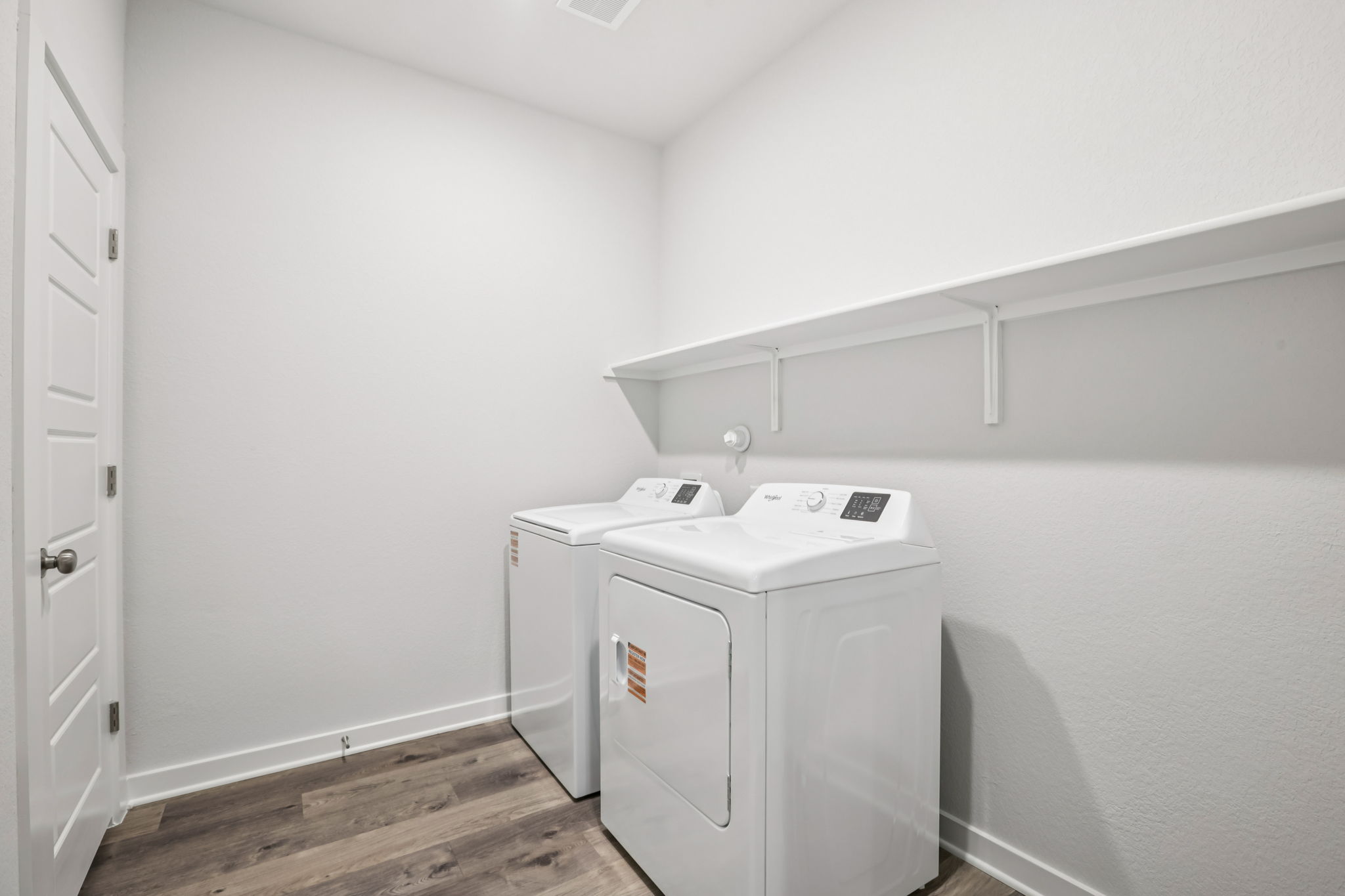A white laundry room.