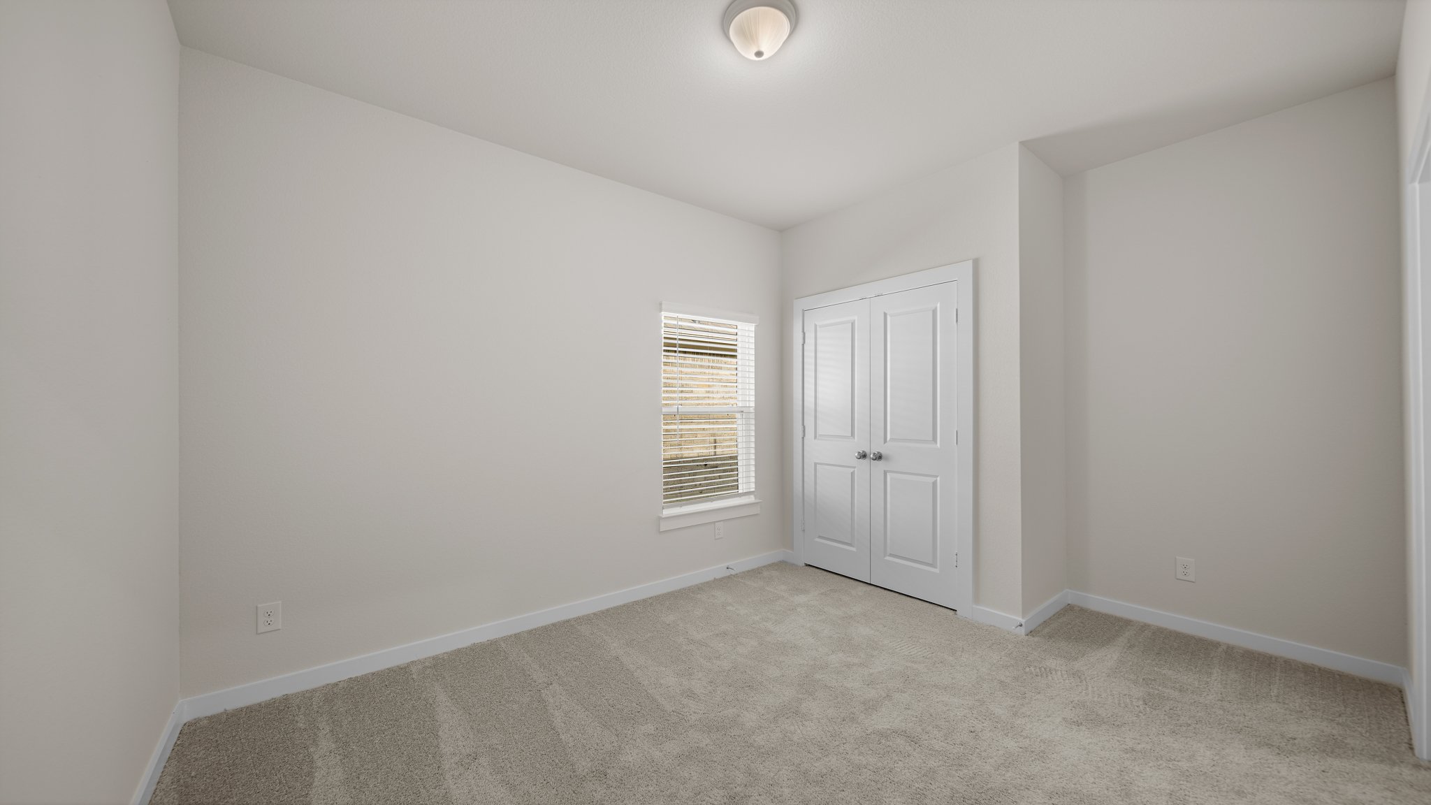 A room with white doors.