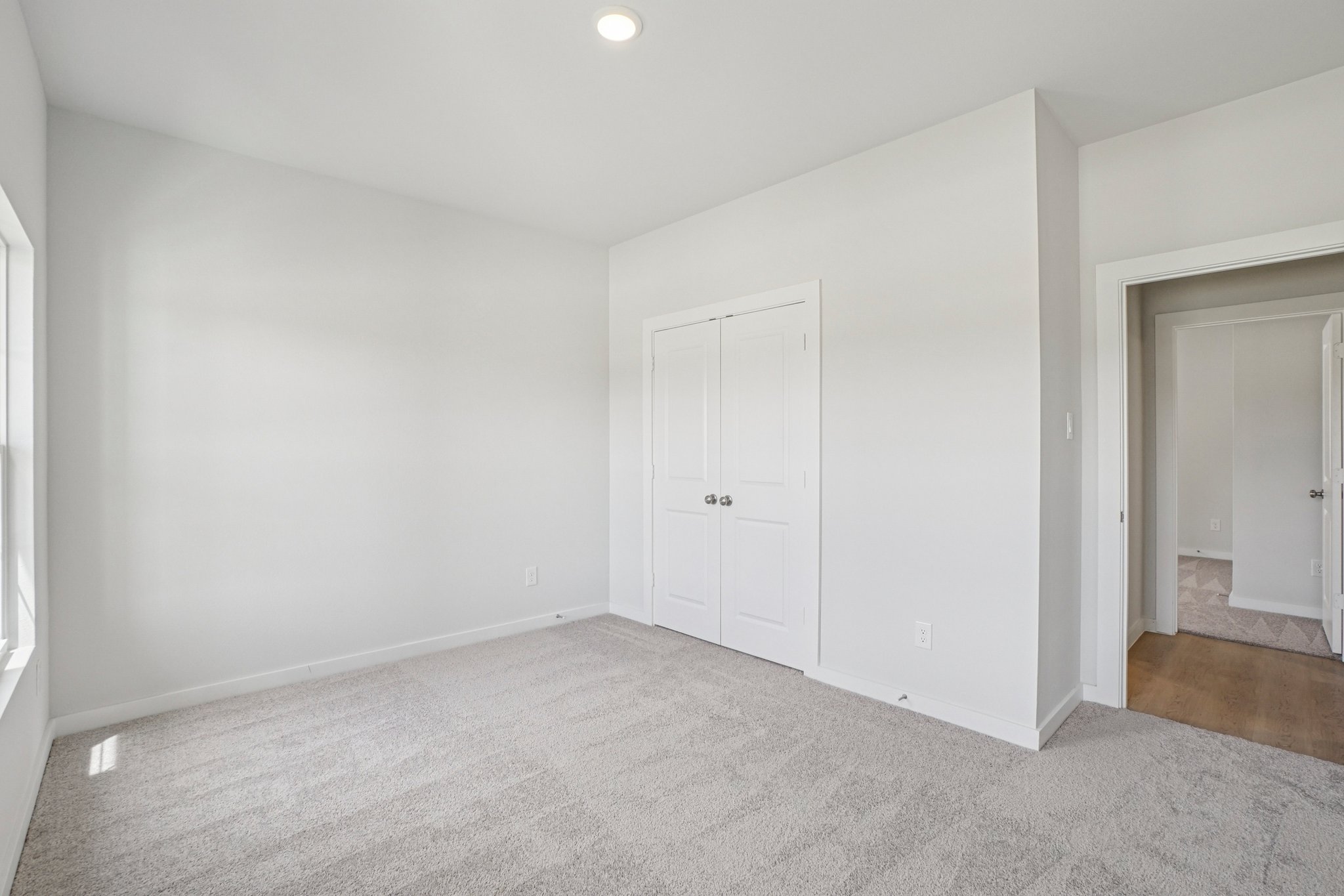 A room with white doors.