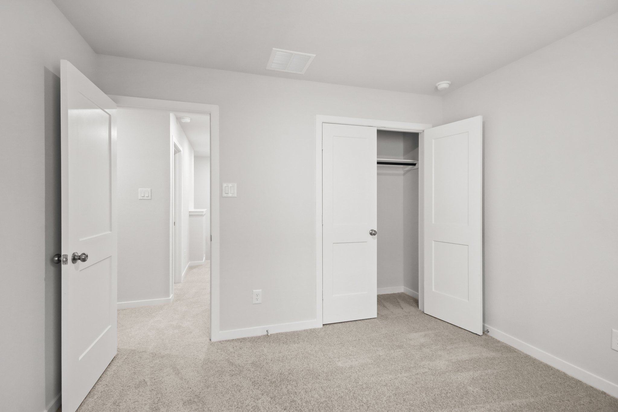 A room with white doors.