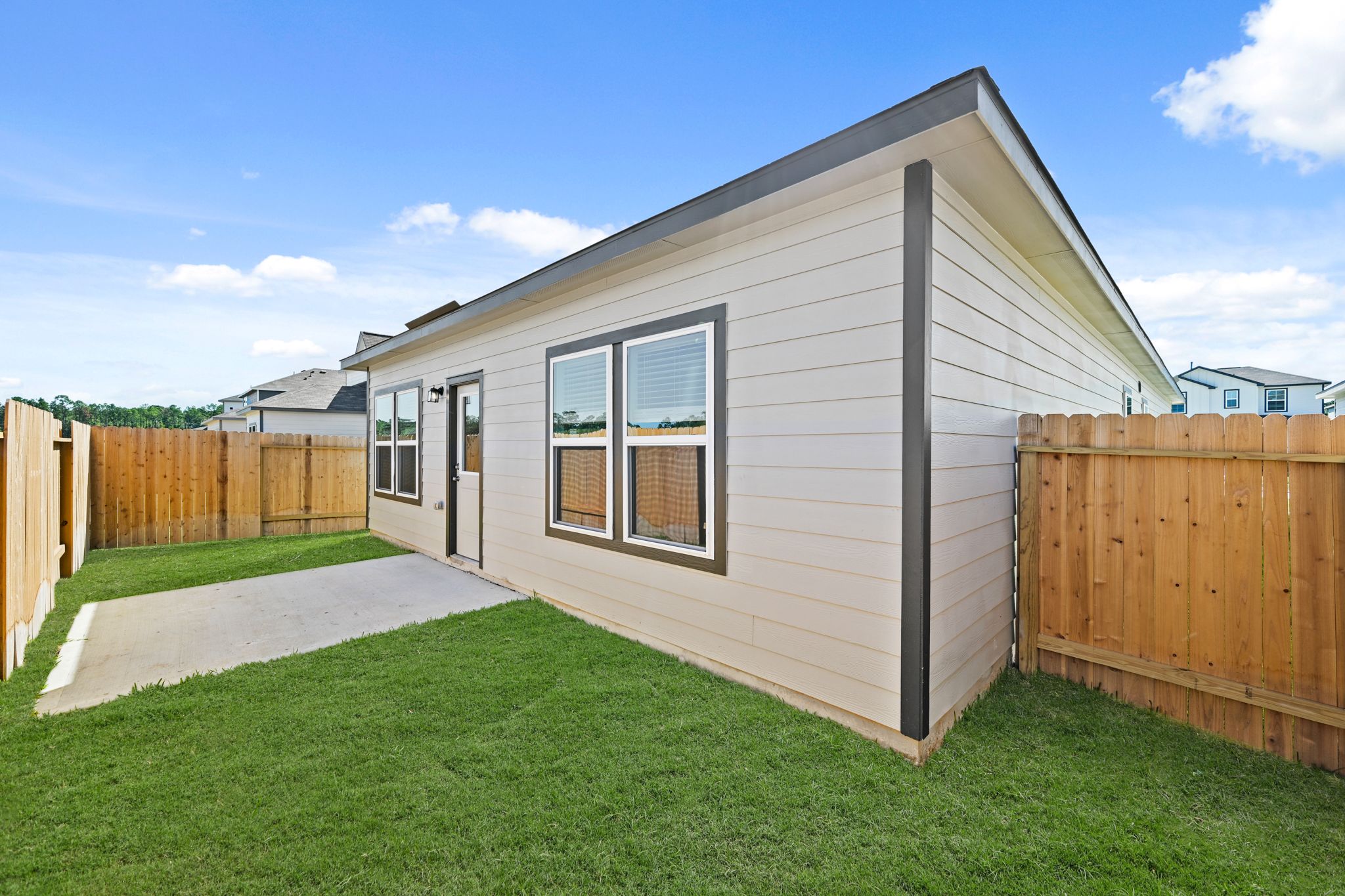 A house with a fence around it.
