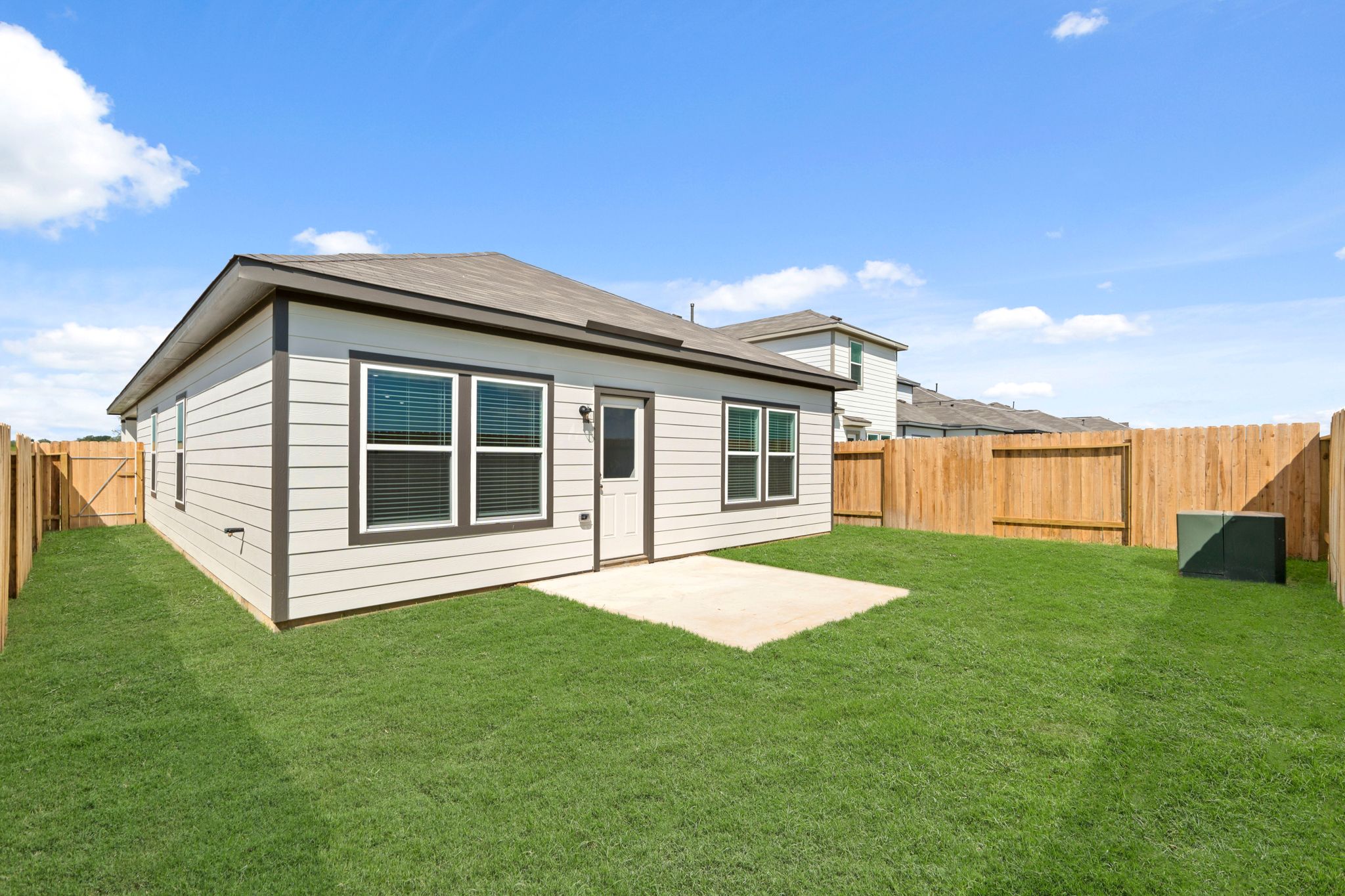 A house with a fence around it.