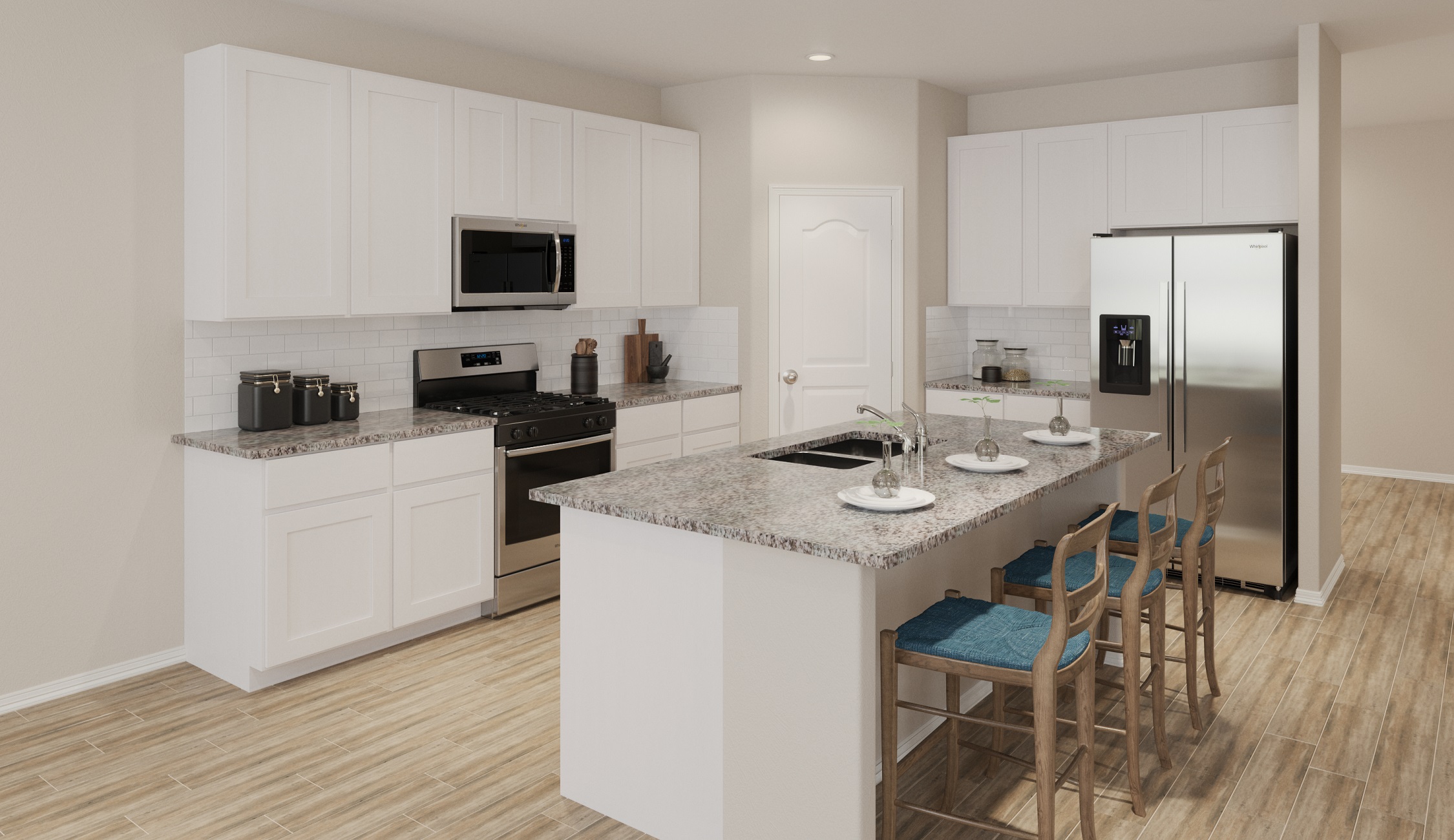 A kitchen with white cabinets.