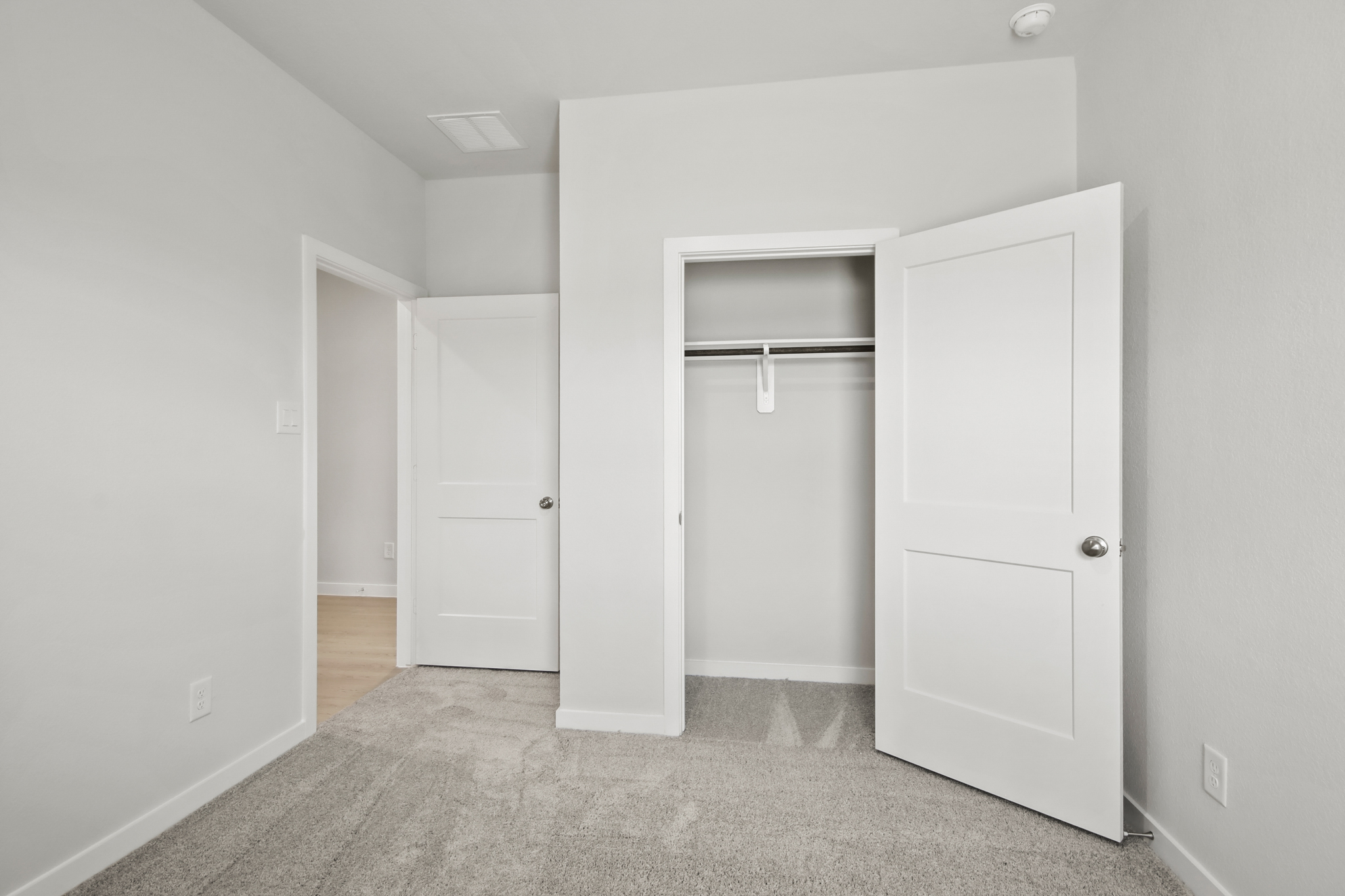 A room with white doors.