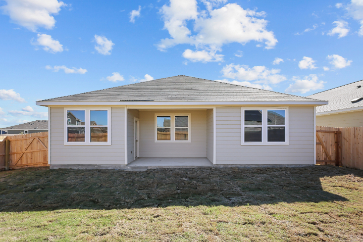 A house with a fence around it.