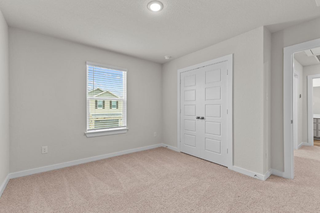 A room with white doors.