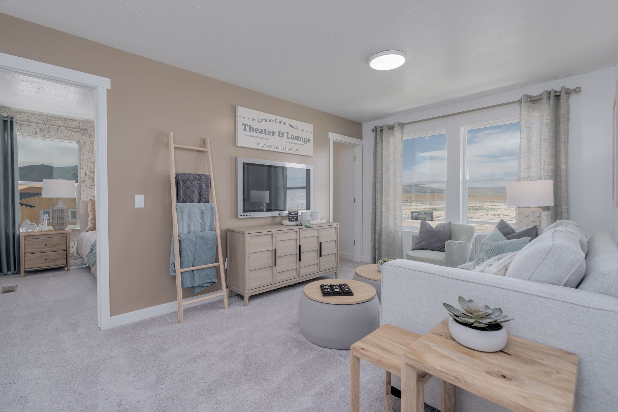 A living room with a couch and a table.
