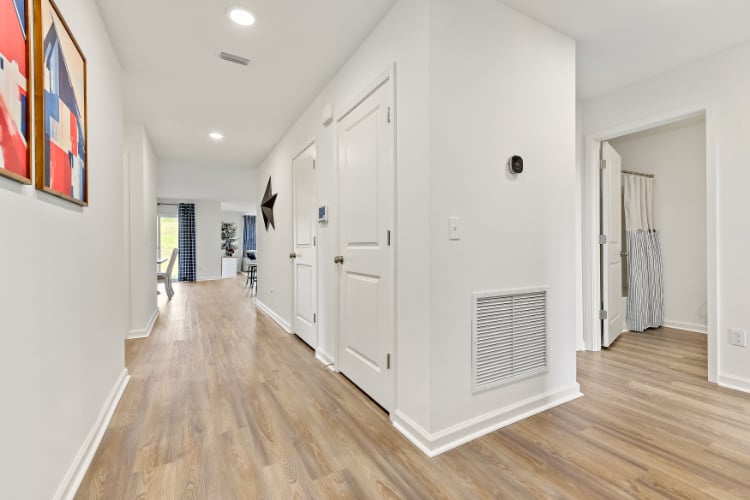 A room with white cabinets.